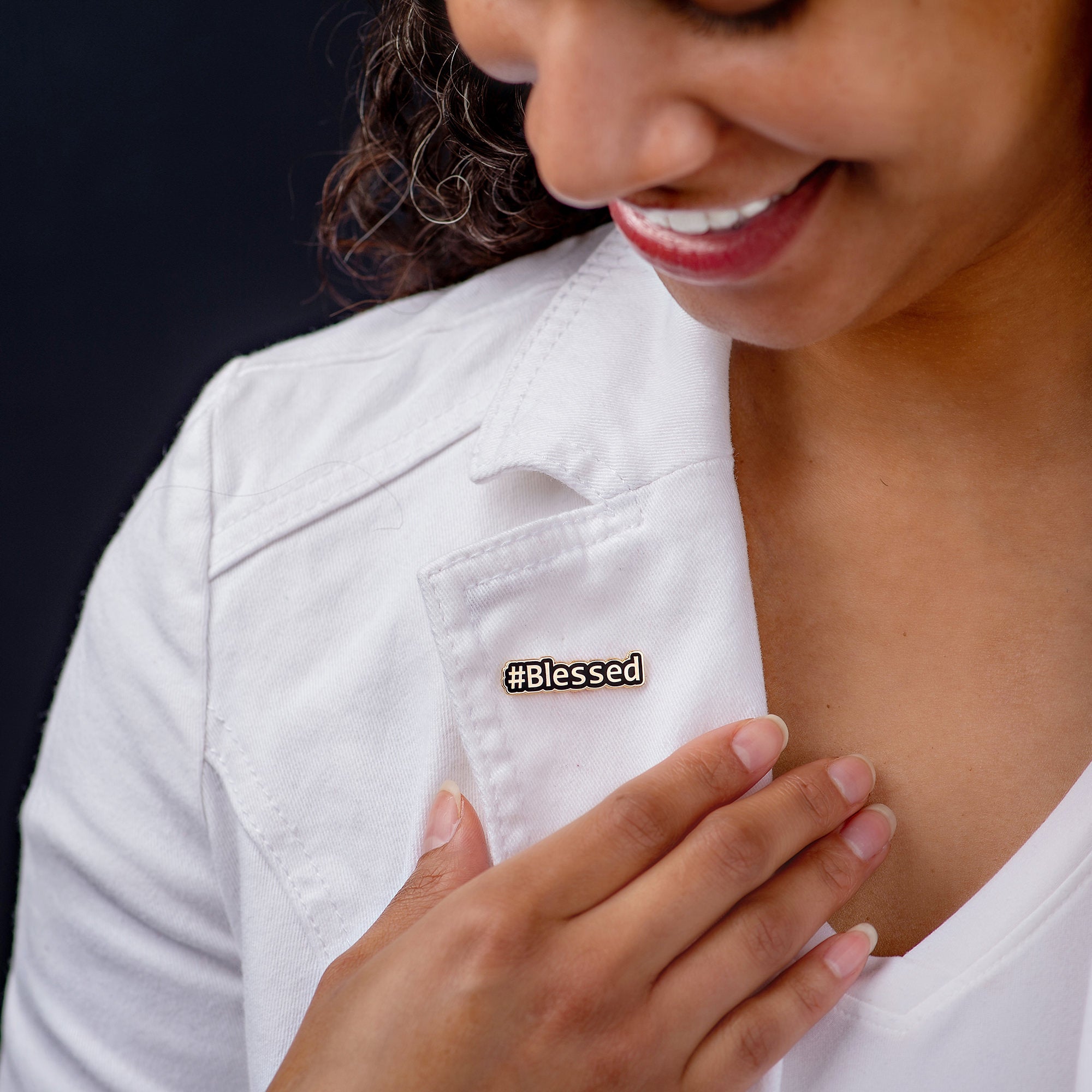  Image of woman in white jacket, possibly a nurse, proudly showcasing her 