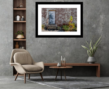 Photograph of an old brick wall in Decatur, Alabama, showing weathered texture and historic architectural detail.