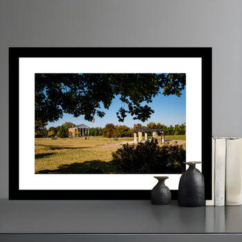 Photograph of Old Bank Park in Decatur, Alabama, featuring trees, benches, and a historic Southern park setting.