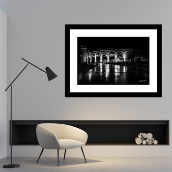 The towering white and black spacecraft stands as a powerful symbol of innovation, exploration, and our endless quest to reach beyond Earth. Set against a backdrop of fluffy white clouds and an expansive, brilliant sky, the image evokes a feeling of limitless possibilities and grand achievement.