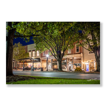 Charming Nightlife on Historic Main Street – Cozy Urban Street Scene Photography by Neville Simpson.