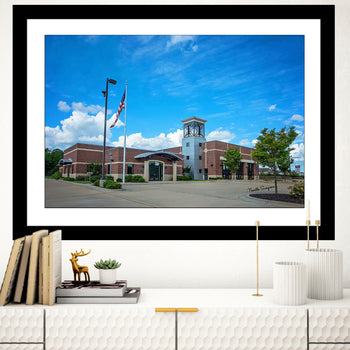 Moulton Fire Department in Lawrence County on a sunny day with an American Flag blowing in the breeze.