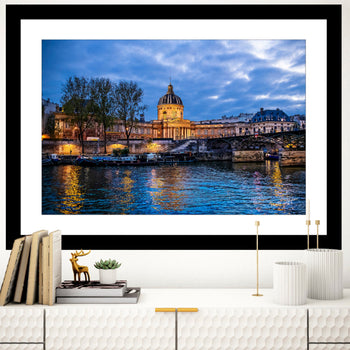 A fine art print featuring a scenic view of the River Seine in Paris, with the Institut de France and Pont des Arts Bridge prominently displayed.